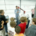 "Dream It. Do it." Mega hosts Maine students, parents and teachers on National Manufacturing Day in 2013